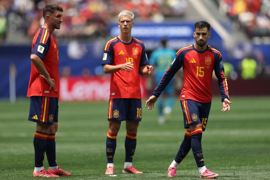 Aymeric Laporte #14, Dani Olmo #10 and Alex Baena
